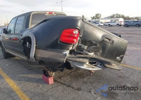 2002 Ford F-150 Lariat/Xlt z USA, uszkodzony, nr VIN 1FTRW07LX2KC53615